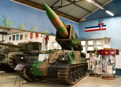 An AMX-30 &quot;Pluton&quot; in the Musée des Blindés, in Samur, France. The Pluton was a system to mount a ballistic missile launcher onto the readily available AMX-30 chassis. Ultimately the system was phased out in favor of more conventional weapons.
