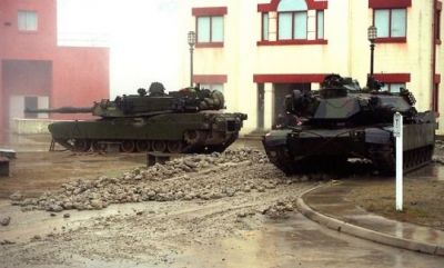 A pair of American Abrams tanks on a training exercise, sometime in the last few years.